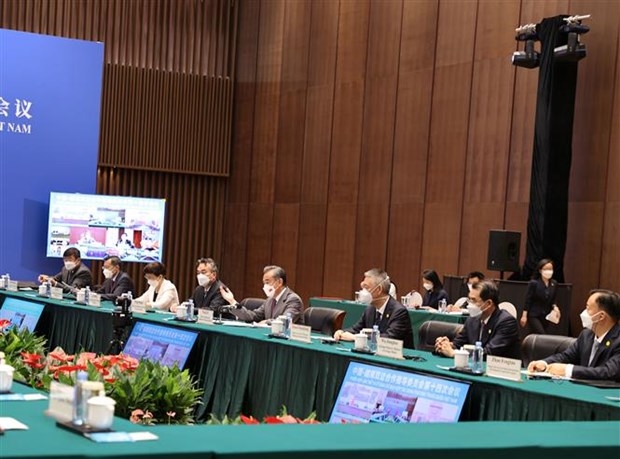 中国国务委员兼外交部长王毅及中国越南代表团出席会议。（图：越通社）