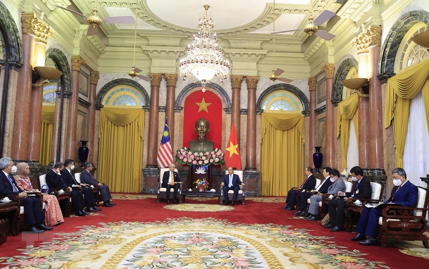 越南国家政府主席会见马来西亚总理。（图源：越通社）