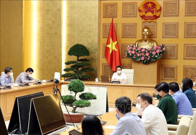 越南政府副总理武德担8月13日主持新冠肺炎疫情防控国家指导委员会会议。