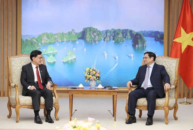 越南政府总理范明政会见新加坡副总理王瑞杰。