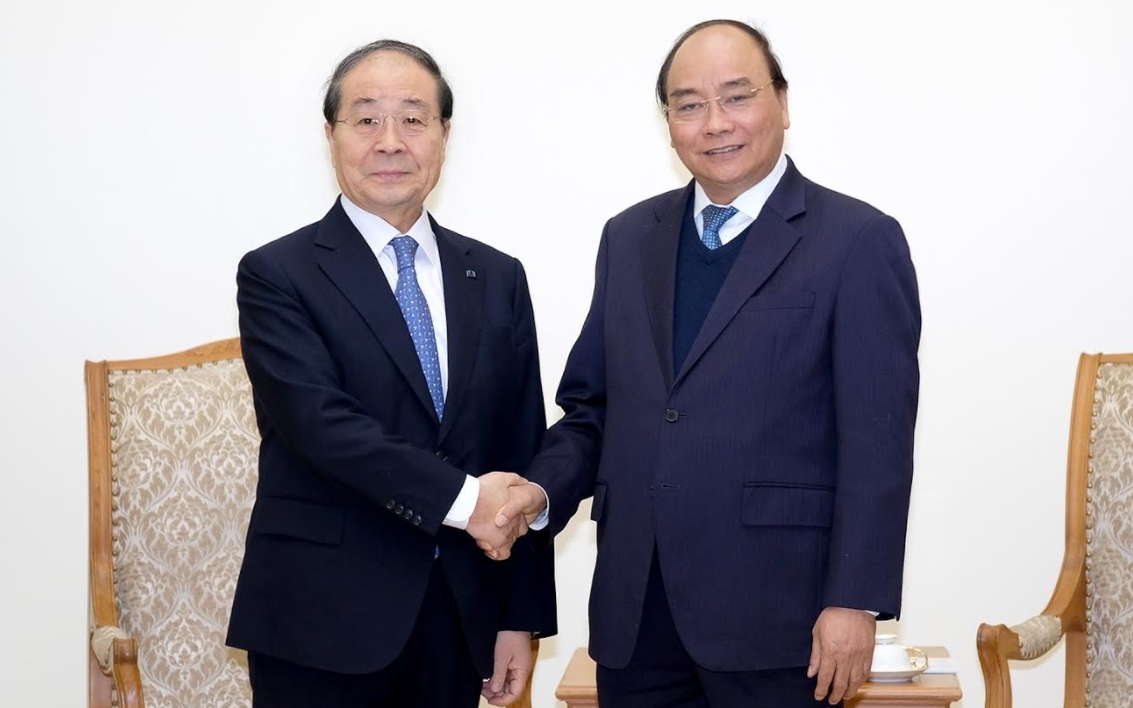 越南国家主席阮春福会见韩国泛高集团总裁崔英珠。
