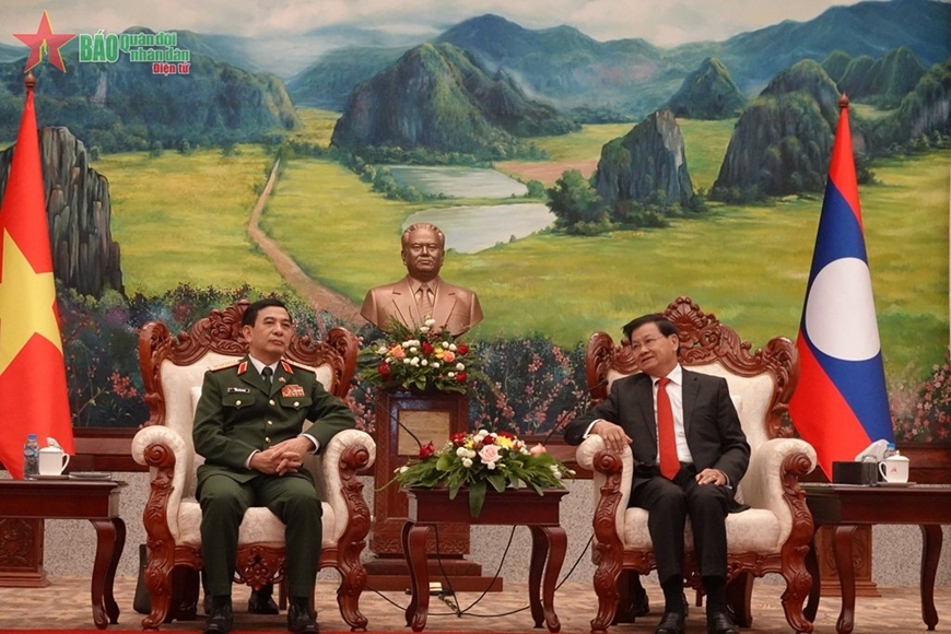 越共中央政治局委员、中央军委副书记、越南国防部长潘文江大将拜访老挝人民革命党中央委员会总书记、国家主席通伦·西苏里。
