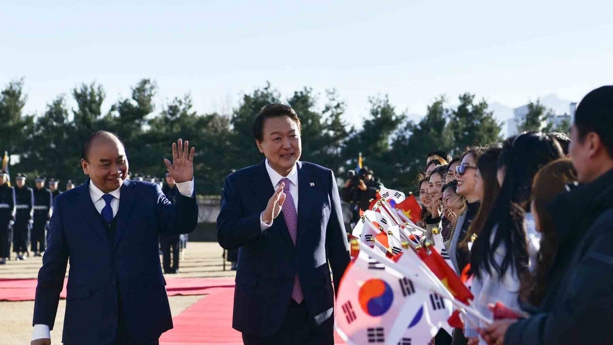 越南国家主席阮春福与韩国总统尹锡烈。