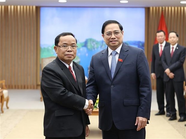 越南政府总理范明政会见老挝人民革命党中央检查委员会主任蓬马塔