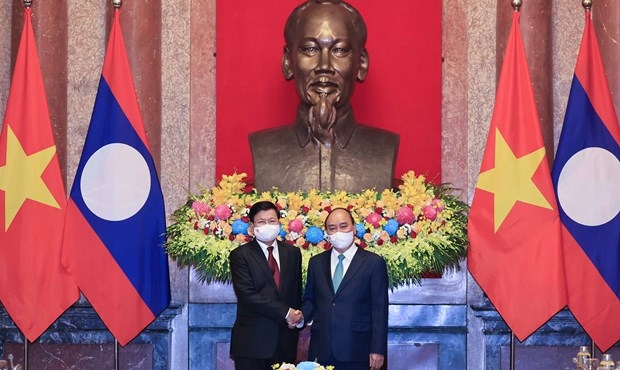 越南国家主席阮春福会见老挝人革党中央总书记、国家主席通伦·西苏里