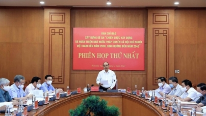 建设和完善越南社会主义法治国家，为更好地服务人民