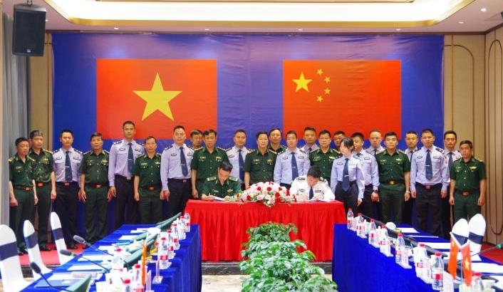 越中两国代表团代表签署了2023年第一季度定期工作会议的谅解备忘录。（图：辉杨）