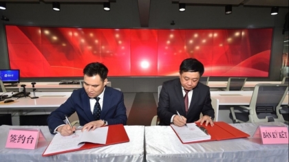 广宁省传媒中心与广西壮族自治区日报传媒集团签署传媒合作协议