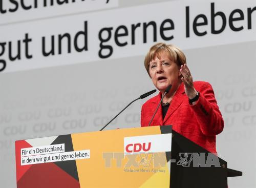 德国总理默克尔对与社会民主党的谈判前景表示乐观