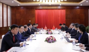 越南政府副总理兼外长范平明与中国国务委员兼外长王毅举行双边会晤