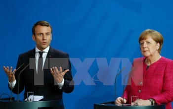 法国总统马克龙会见德国总理默克尔
