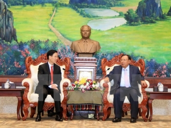老挝人民革命党中央总书记、国家主席本扬高度评价老越两党中央宣教部的合作结果