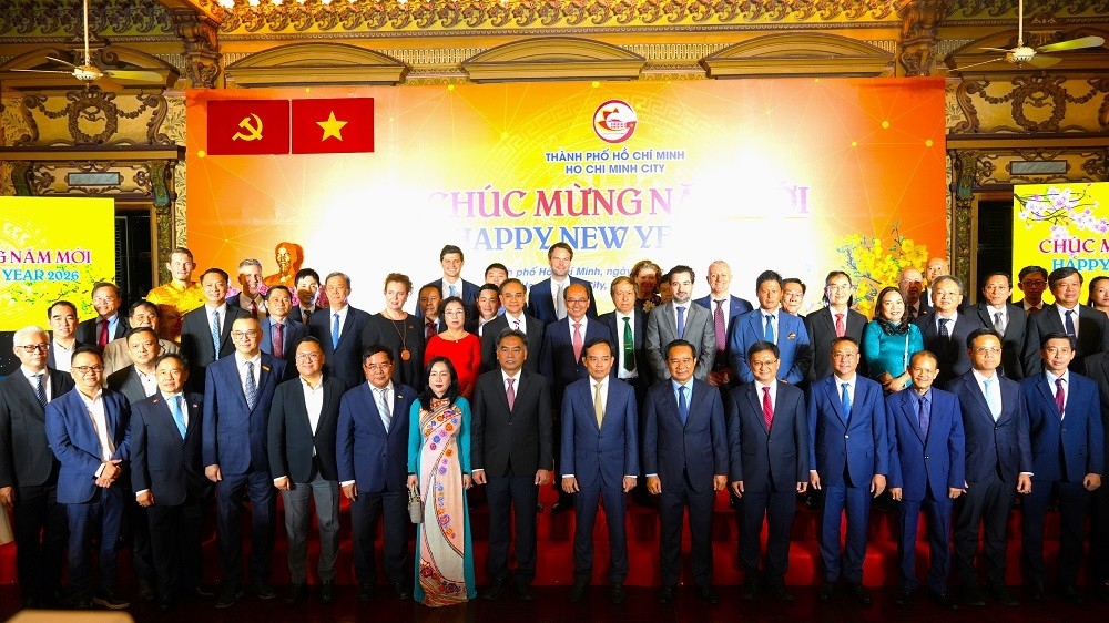 代表们在见面会上合影留念。（图片来源：越南胡志明市电子信息门户网站）