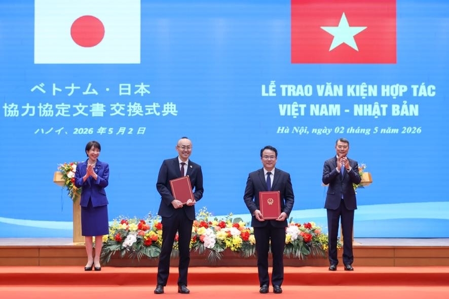 黎明兴总理和高市早苗首相见证越南政府与日本国际协力机构（JICA）之间适应自然灾害的农村发展项目贷款协议（L/A）的交换仪式。