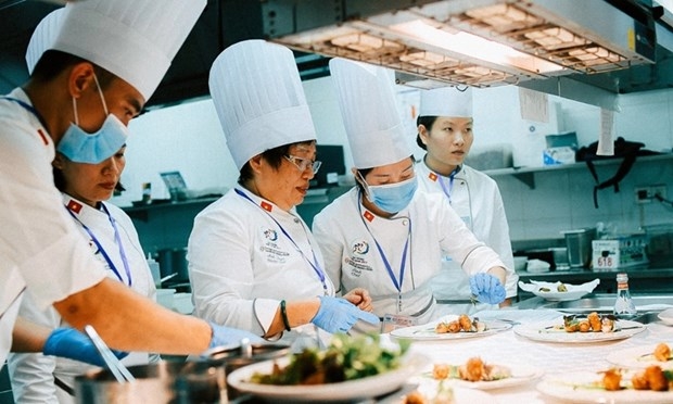 厨师阮氏映雪将越南蟹肉春卷列入服务于出席亚太经合组织领导人非正式会议的各国国家元首的菜单中。