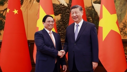 越南政府总理范明政会见中共中央总书记、国家主席习近平