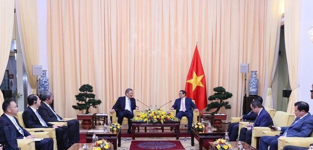 越南政府总理范明政会见中国商务部部长王文涛。