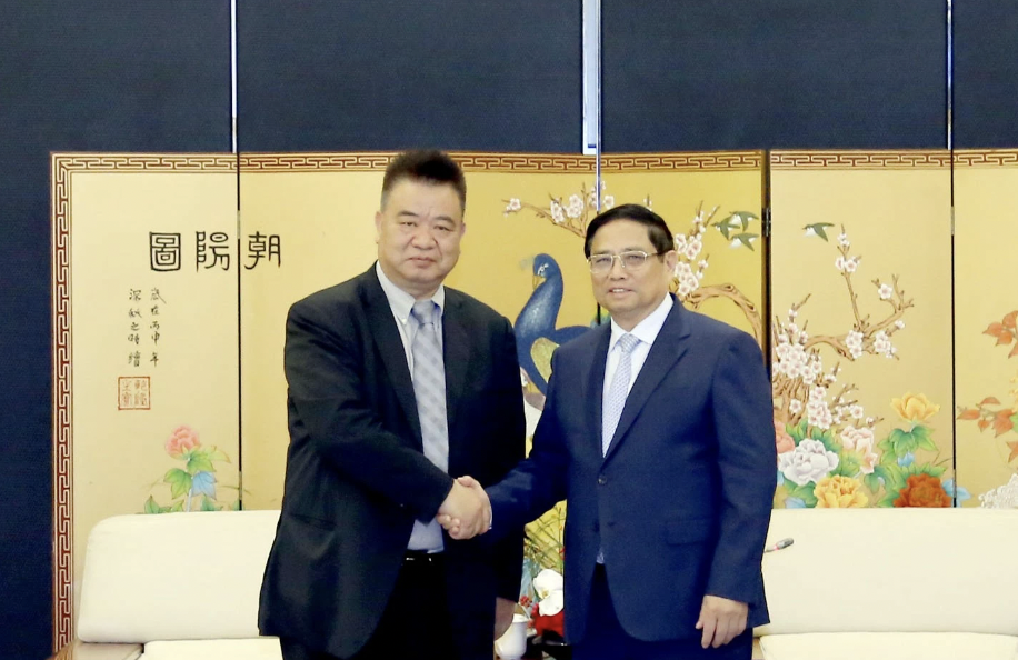 越南政府总理范明政会见昆明国际花卉拍卖交易中心有限公司领导。